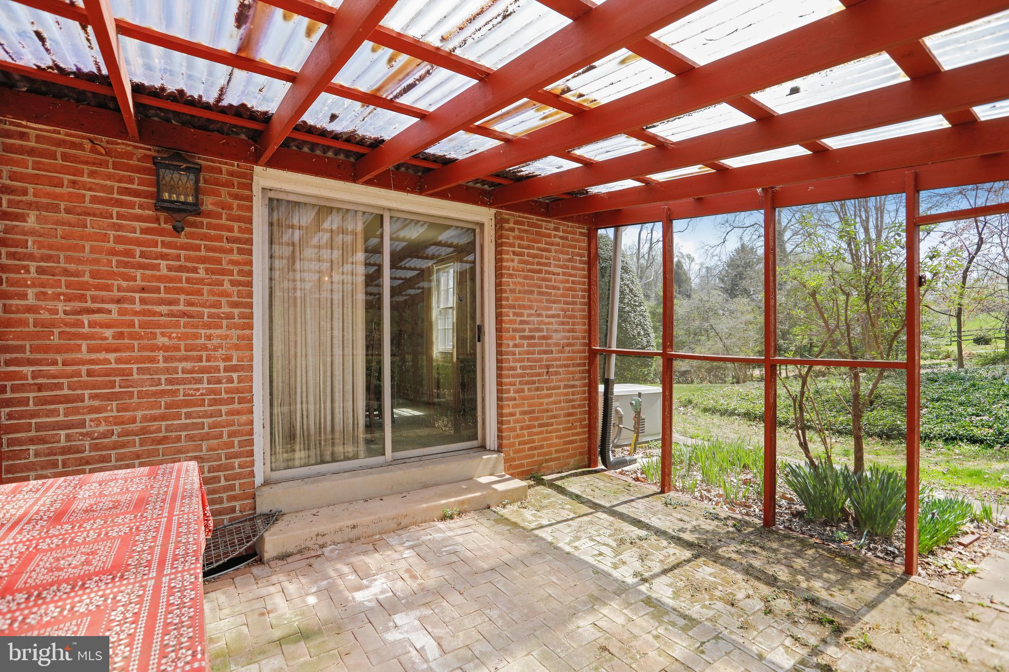 11740 Glen Mill Road Potomac, MD 20854 - Photo 37 of 44 SCREENED IN PATIO OFF THE DINING ROOM