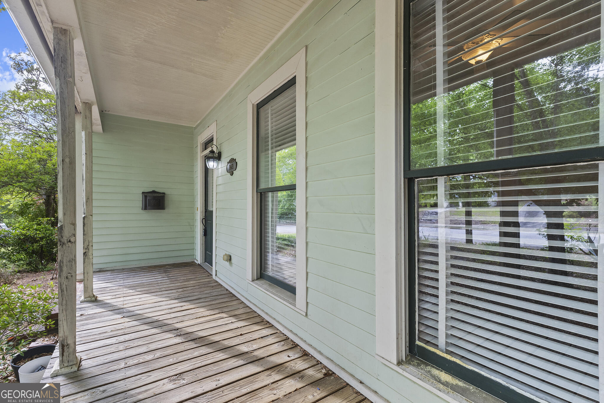 1469 Chestnut Street Macon, GA 31201 - Photo 5 of 26 a view of a porch with wooden floor