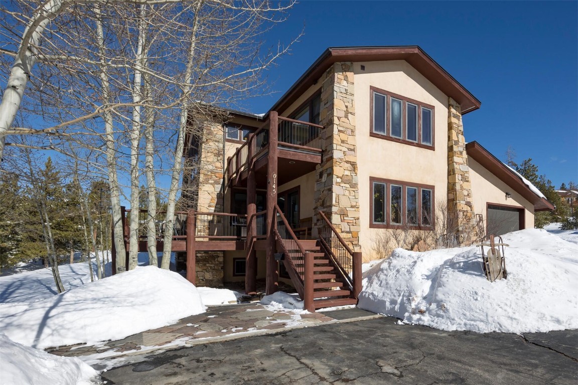145 F Road Silverthorne, CO 80498 - Photo 34 of 35 a front view of a house with a yard