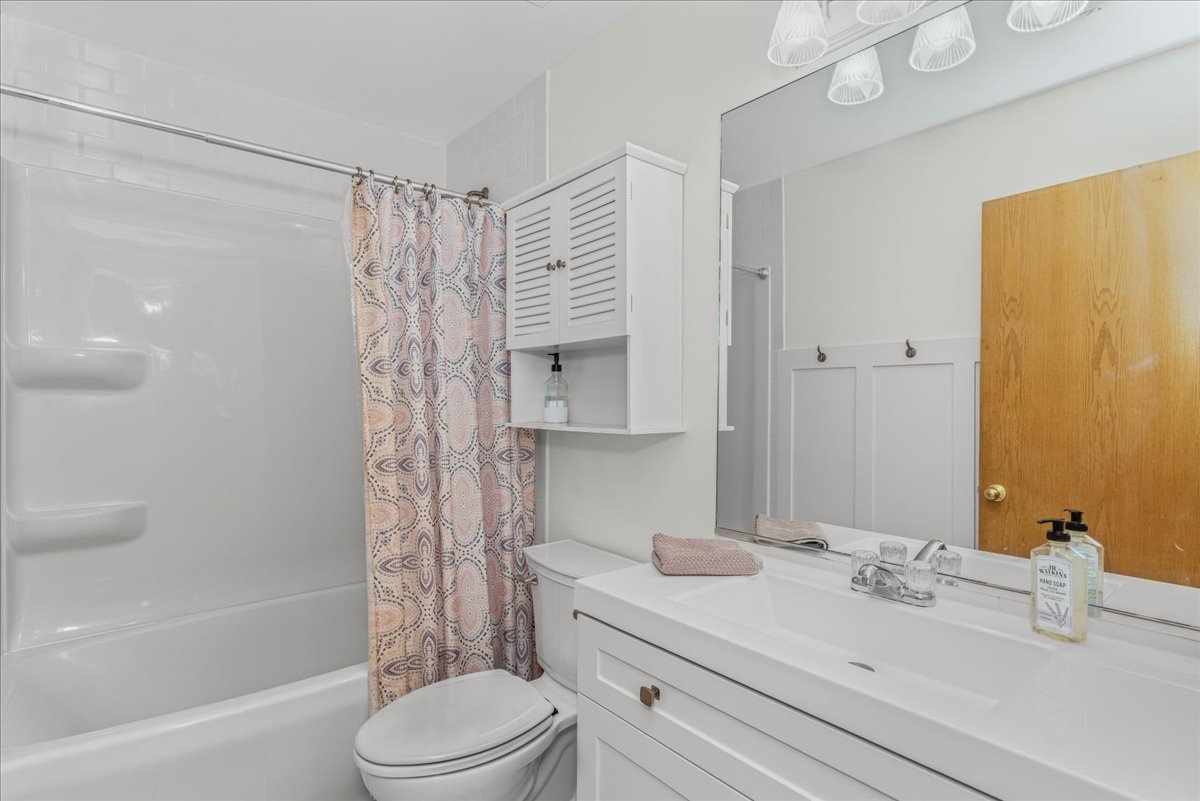 11111 Huron Drive Spring Grove, IL 60081 - Photo 13 of 20 a bathroom with a sink toilet and shower