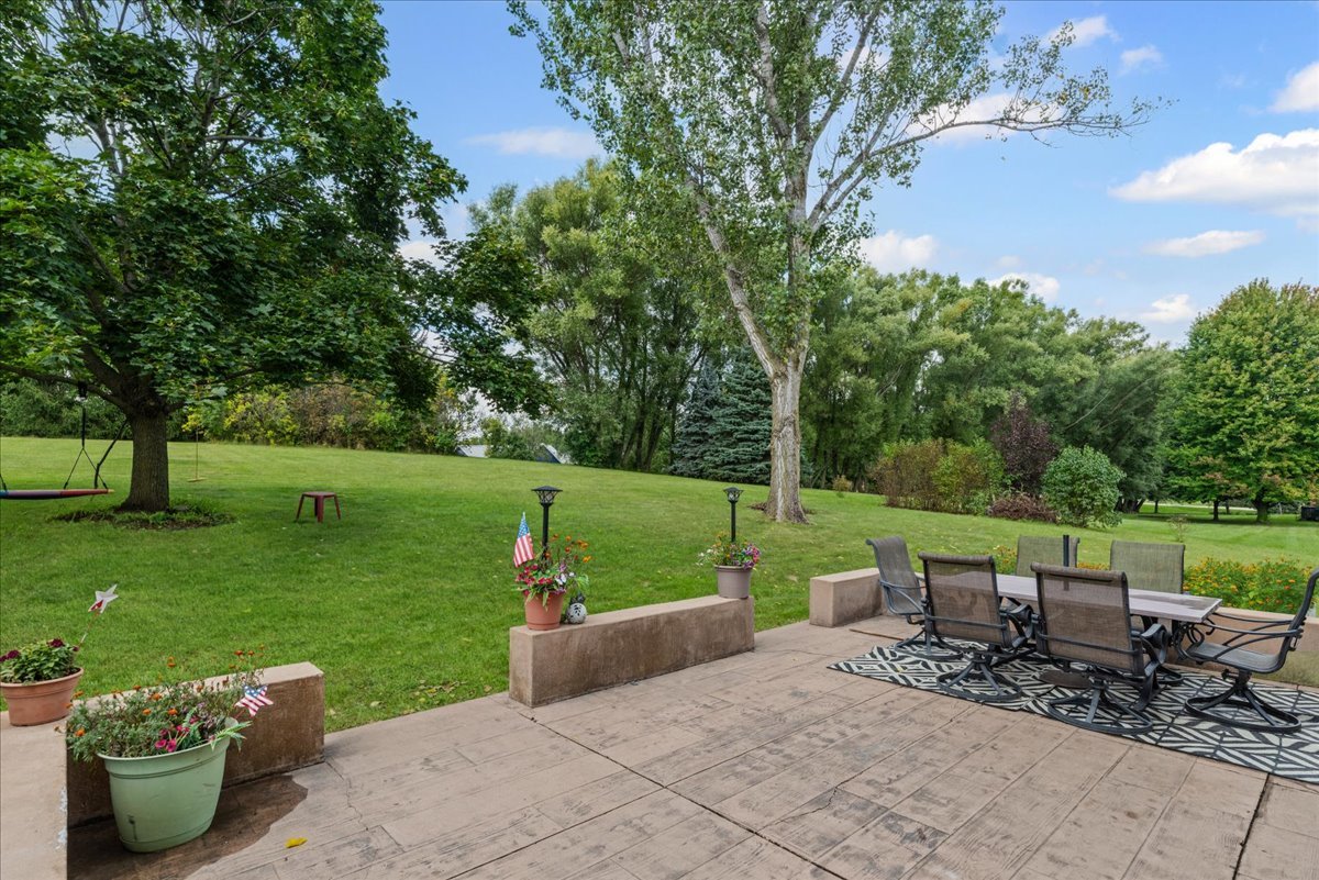 11111 Huron Drive Spring Grove, IL 60081 - Photo 16 of 20 a view of a garden with an outdoor seating