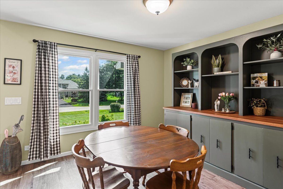 11111 Huron Drive Spring Grove, IL 60081 - Photo 5 of 20 a view of a dining room with furniture window and outside view