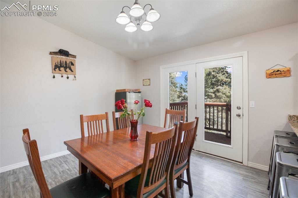 833 Spring Valley Drive Divide, CO 80814 - Photo 20 of 50 a dining room with furniture and window