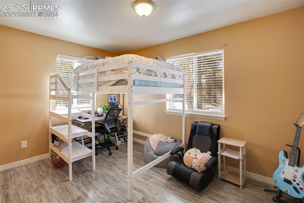 833 Spring Valley Drive Divide, CO 80814 - Photo 30 of 50 a living room with furniture and wooden floor