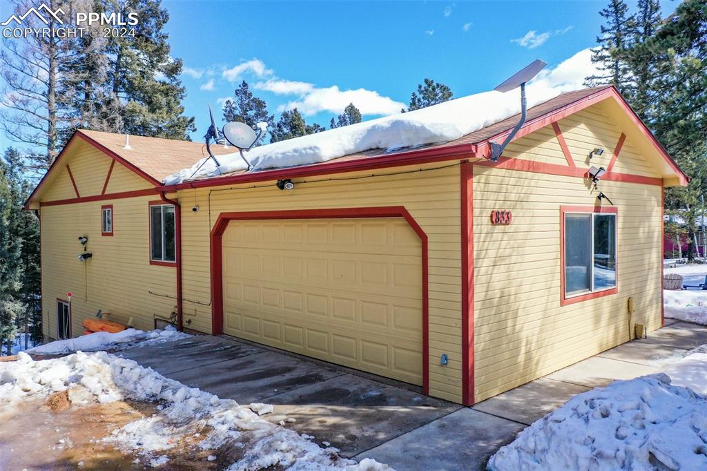 833 Spring Valley Drive Divide, CO 80814 - Photo 4 of 50 a view of a house with a snow