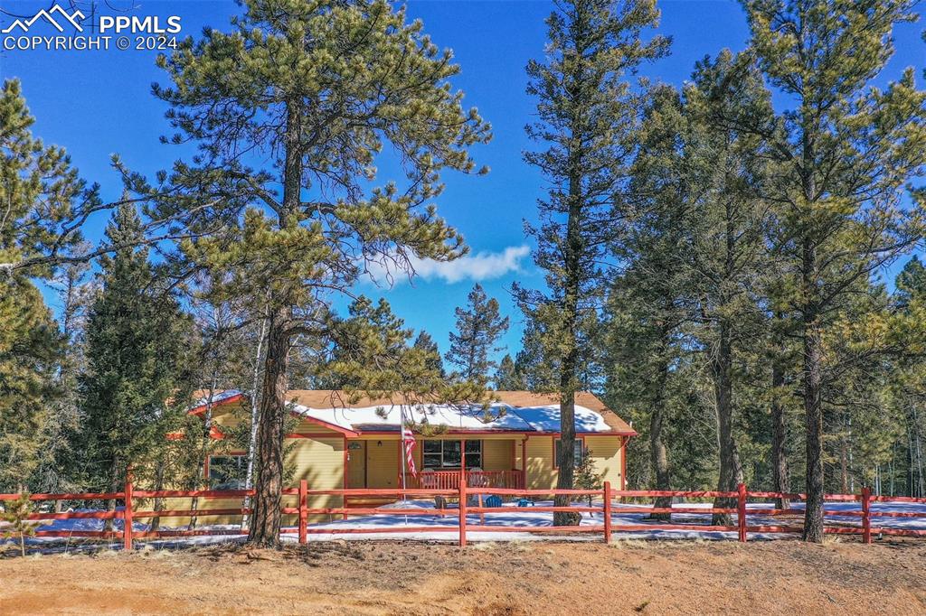 833 Spring Valley Drive Divide, CO 80814 - Photo 7 of 50 a view of a town with large trees