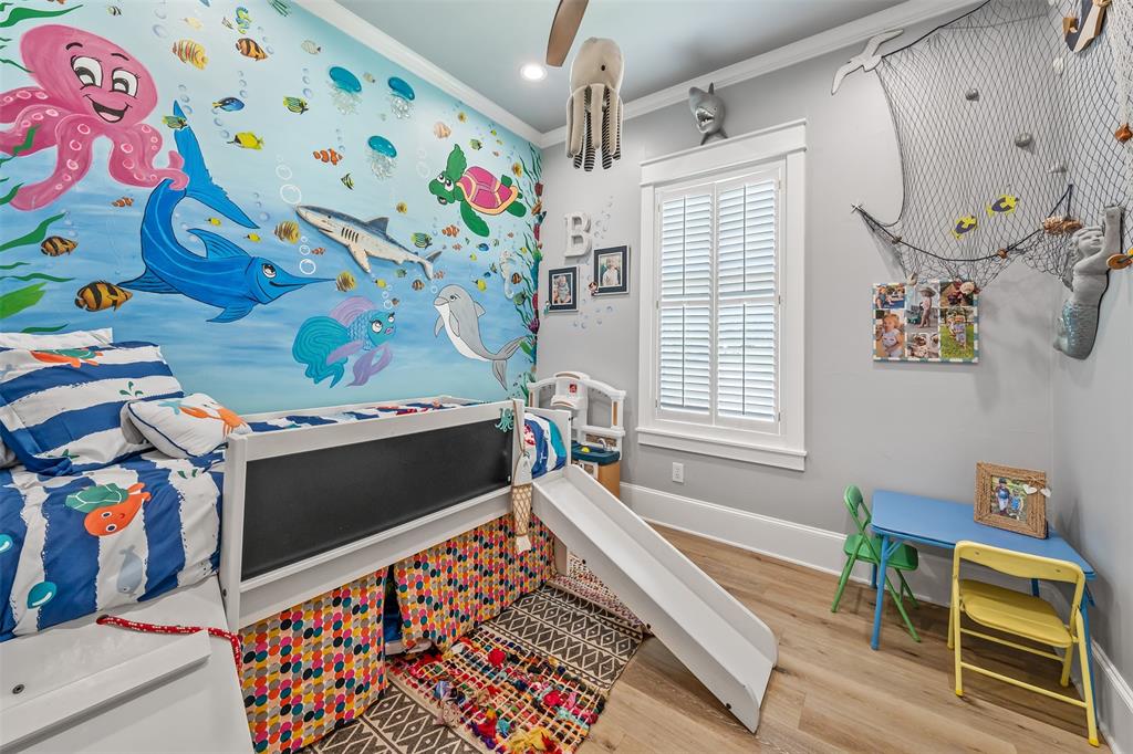 16241 Big Oak Bay Road Tyler, TX 75707 - Photo 22 of 40 Accent wall featuring an aquatic mural