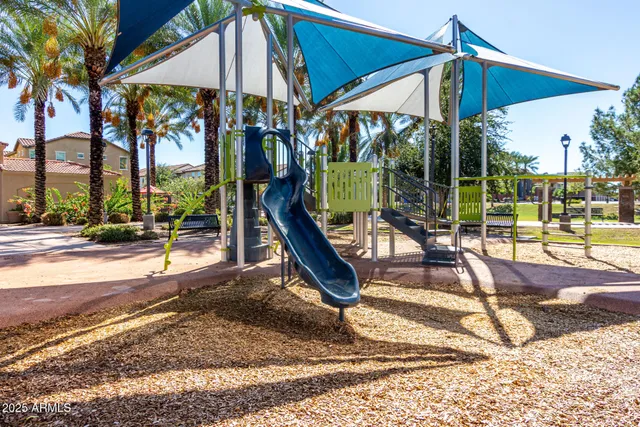 a view of a park with a slide