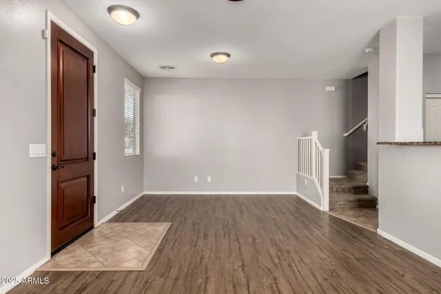 a view of a livingroom with wooden floor