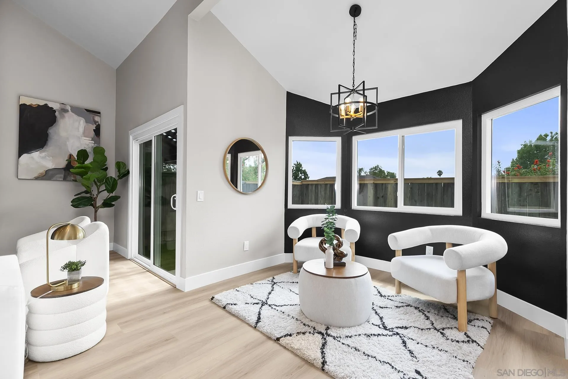 3226 Old Heather Road San Diego, CA 92111 - Photo 13 of 45 a living room with furniture and a large window