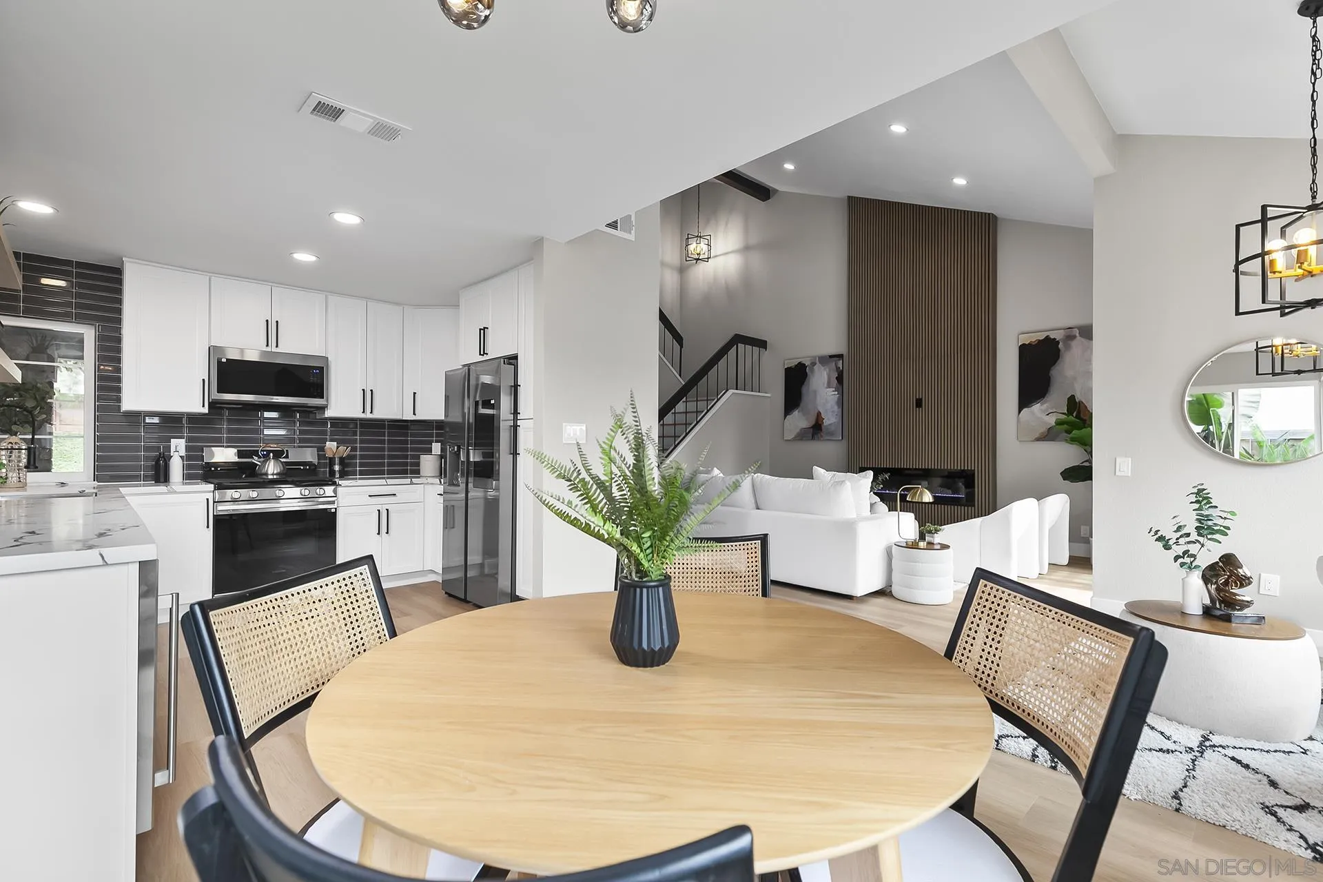 3226 Old Heather Road San Diego, CA 92111 - Photo 17 of 45 a kitchen with sink and refrigerator