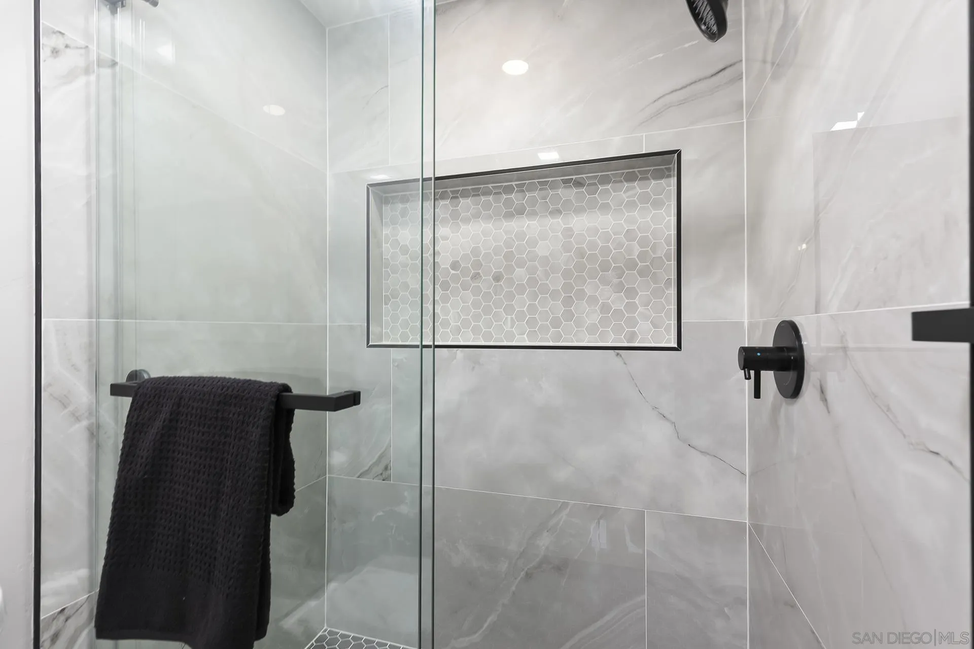 3226 Old Heather Road San Diego, CA 92111 - Photo 33 of 45 a bathroom with a shower