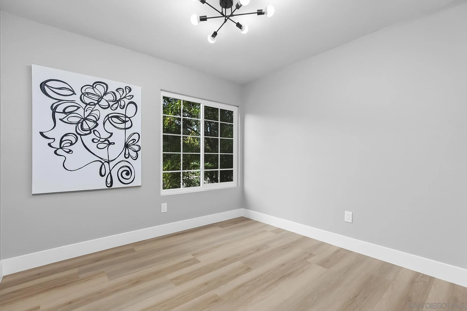 3226 Old Heather Road San Diego, CA 92111 - Photo 35 of 45 an empty room with a window
