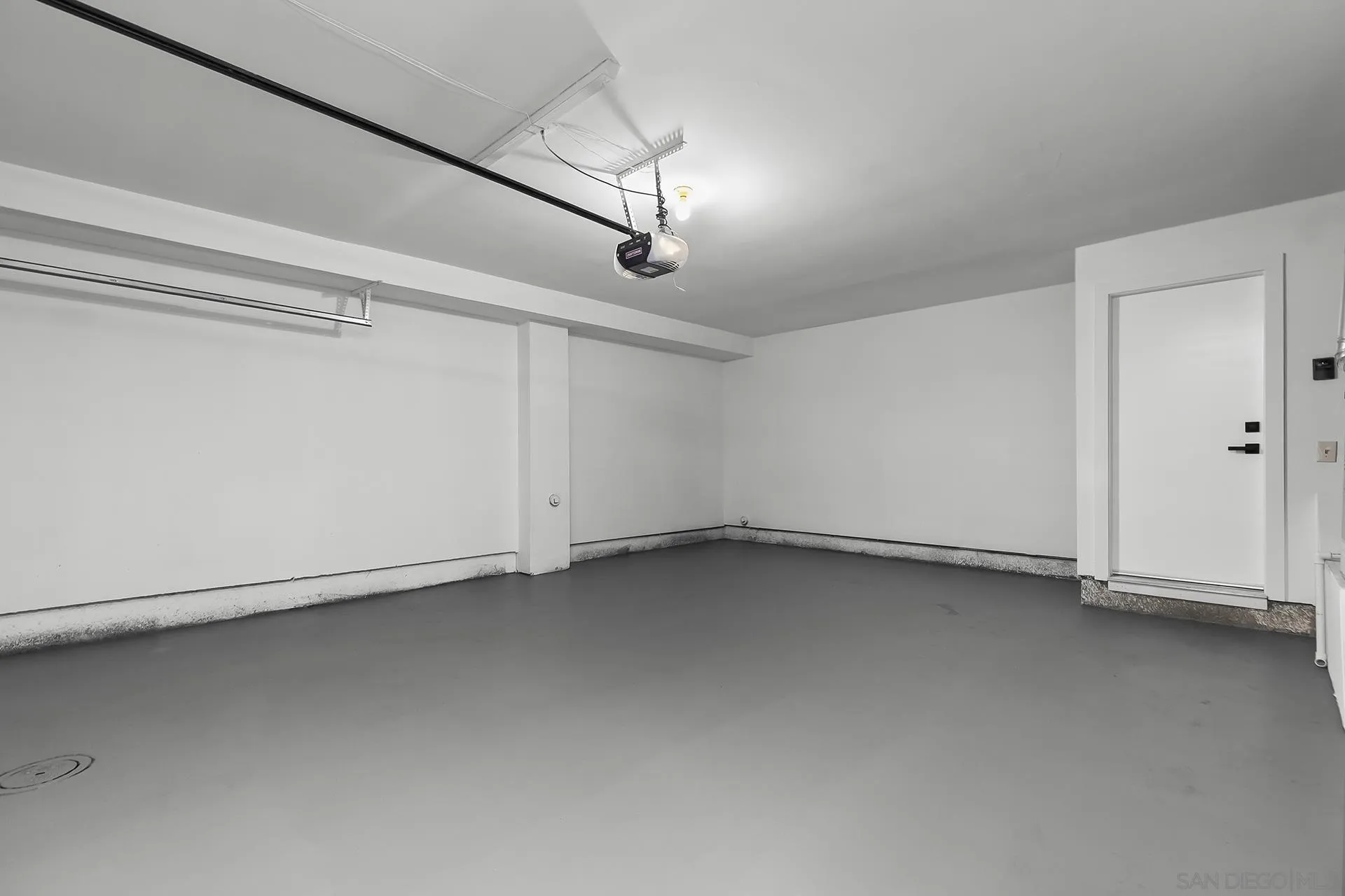 3226 Old Heather Road San Diego, CA 92111 - Photo 40 of 45 a view of a room with rack on the wall