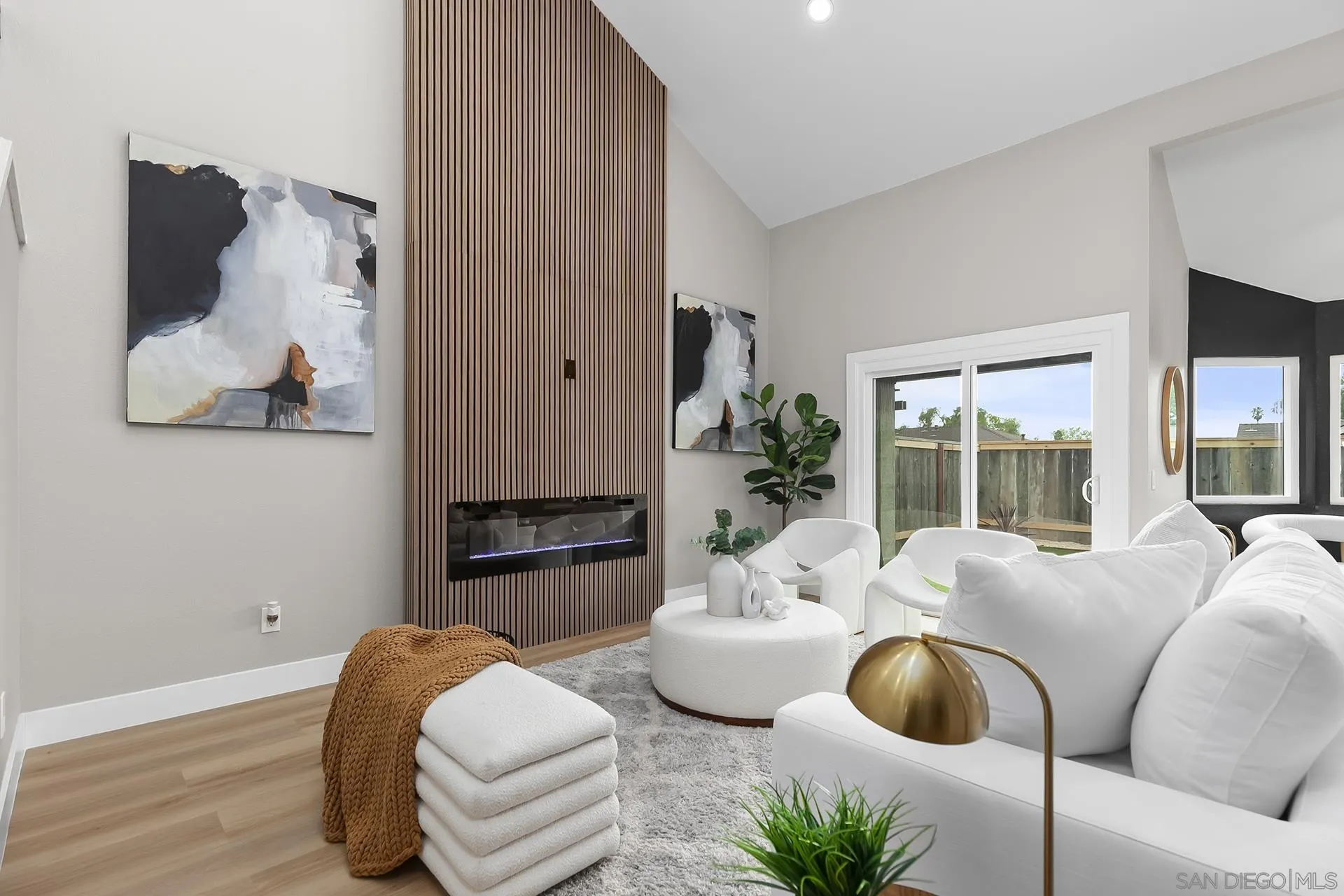3226 Old Heather Road San Diego, CA 92111 - Photo 4 of 45 a living room with furniture and a large window