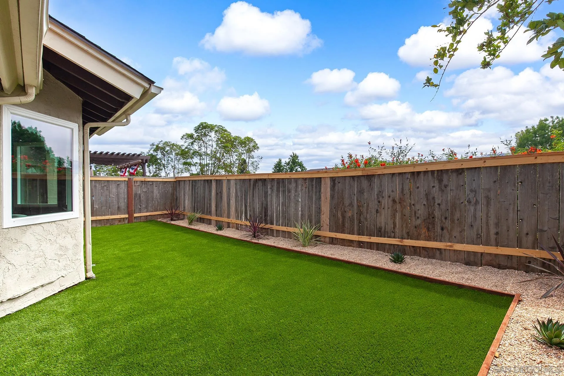 3226 Old Heather Road San Diego, CA 92111 - Photo 43 of 45 a view of a backyard with sitting area