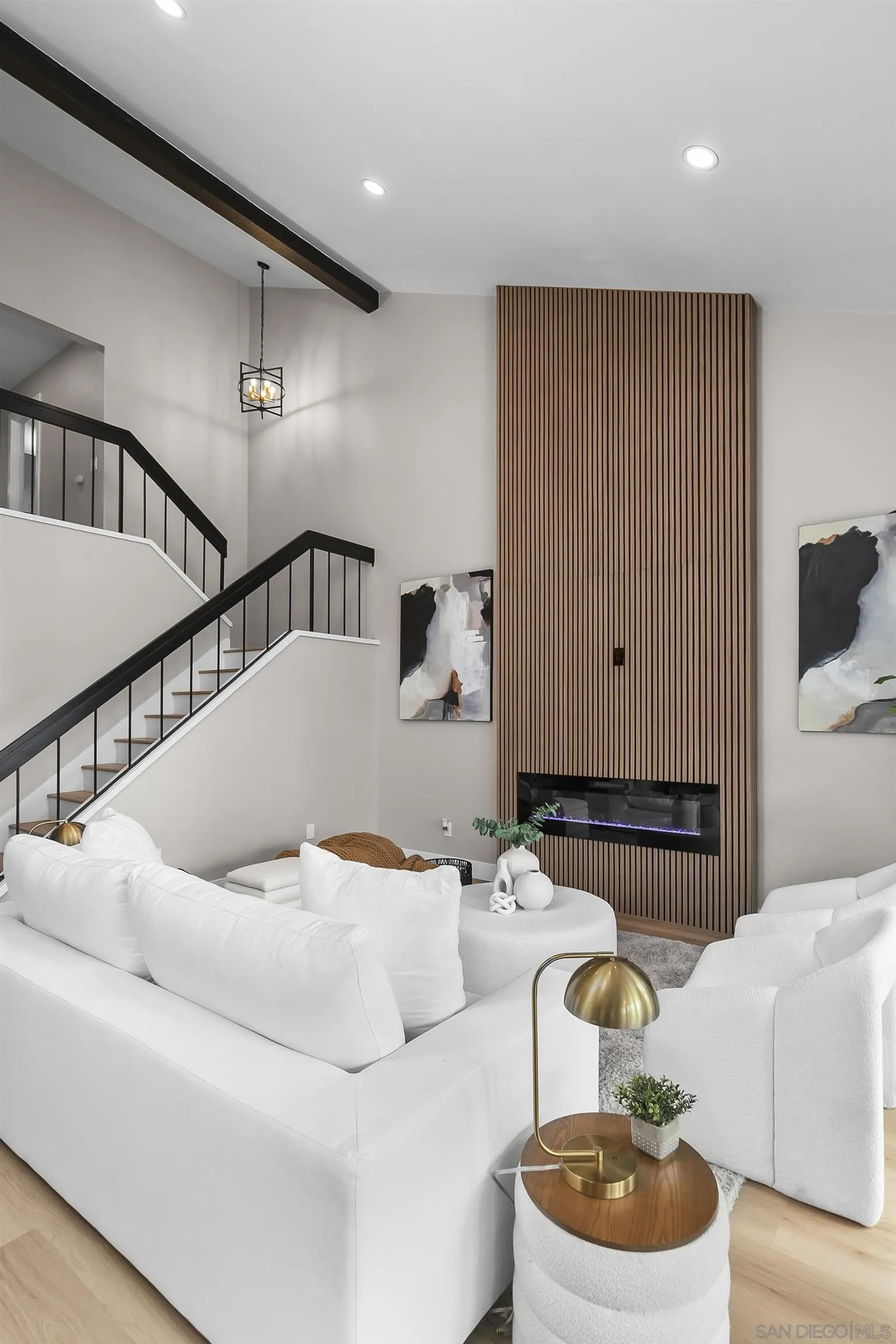 3226 Old Heather Road San Diego, CA 92111 - Photo 8 of 45 a living room with furniture and a painting