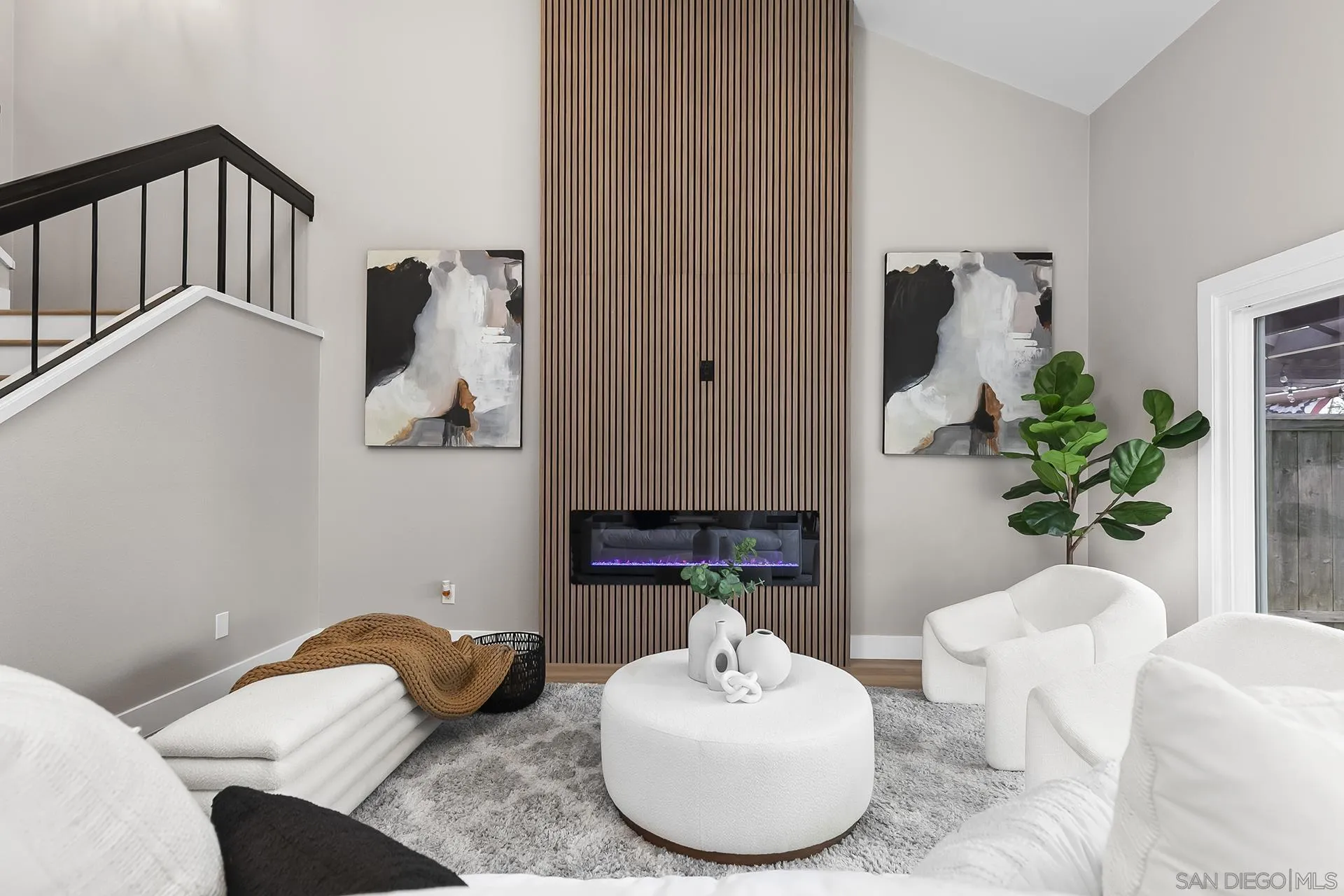 3226 Old Heather Road San Diego, CA 92111 - Photo 9 of 45 a living room with furniture flowerpot and a potted plant