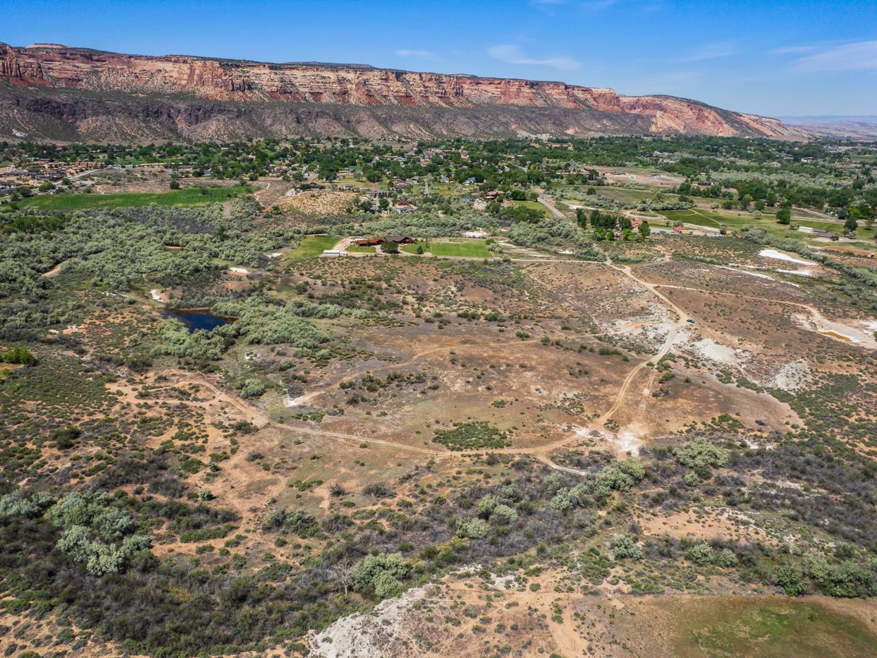 2085 East 1/2 Road Grand Junction, CO 81507 - Photo 4 of 10 a view of a town with mountains