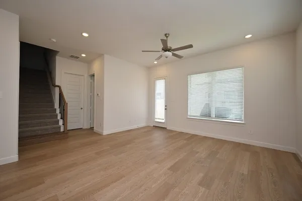 a bathroom with a toilet a sink and bathtub