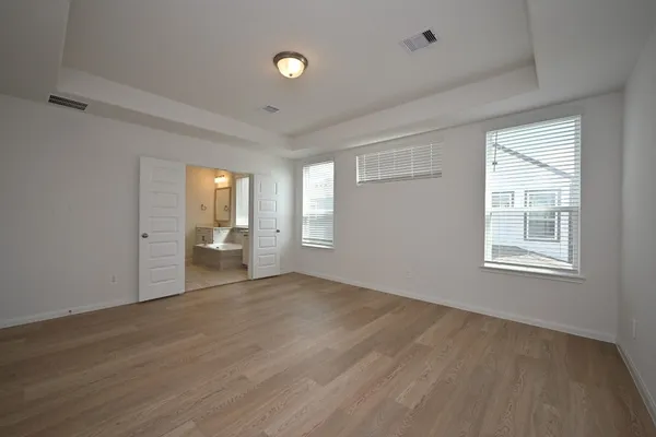 a bathroom with a bathtub and a sink