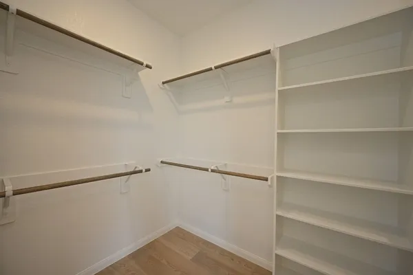 a bathroom with a bathtub and a sink