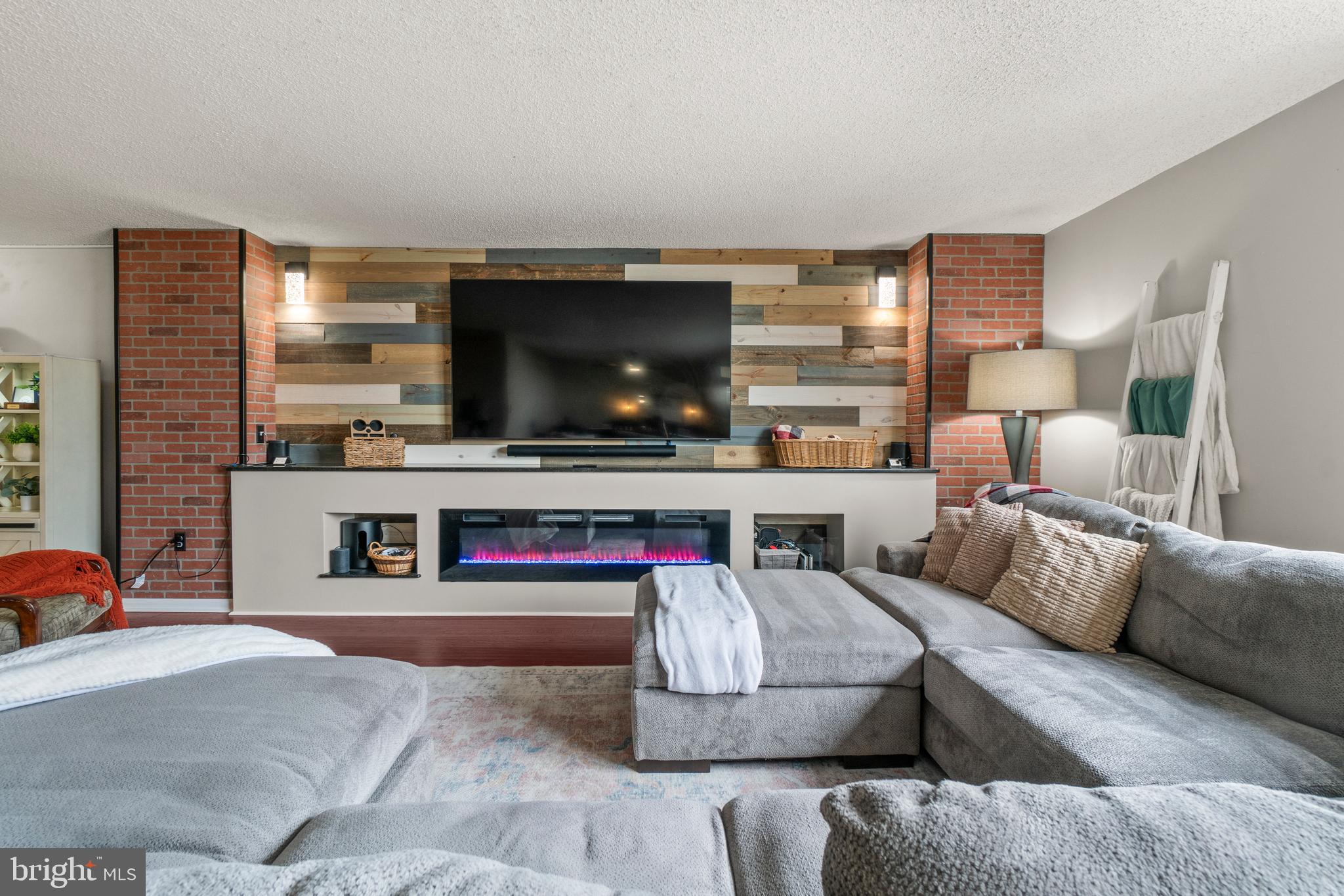 205 East Joppa Road, Unit 708 Baltimore, MD 21286 - Photo 11 of 35 custom Ship lap wall with tv cables inside the wal