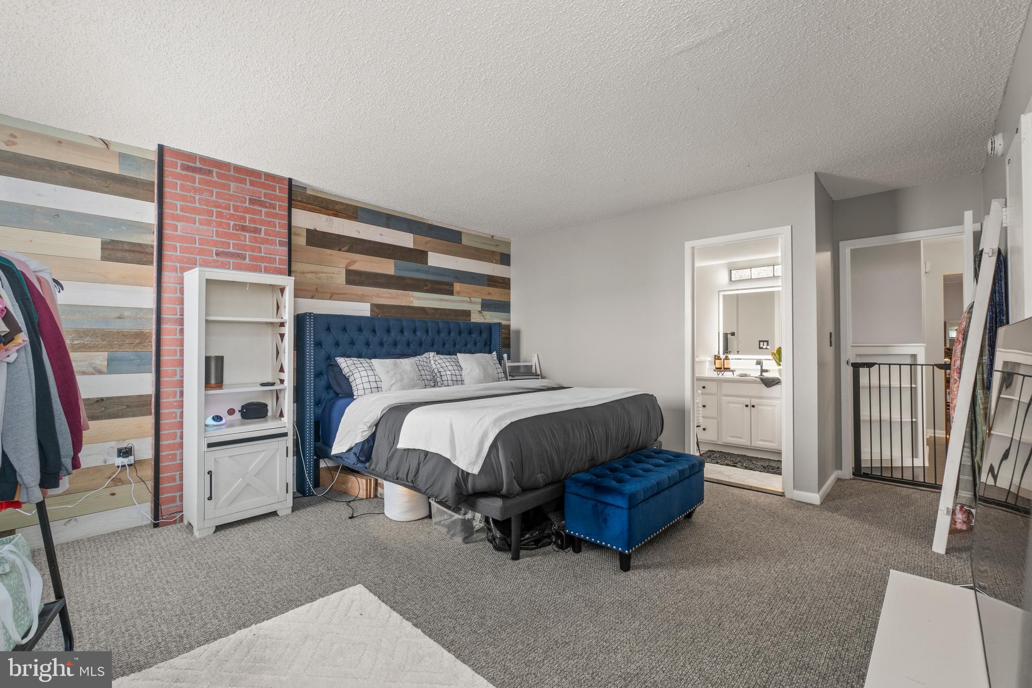 205 East Joppa Road, Unit 708 Baltimore, MD 21286 - Photo 25 of 35 Primary bedroom with custom shiplap