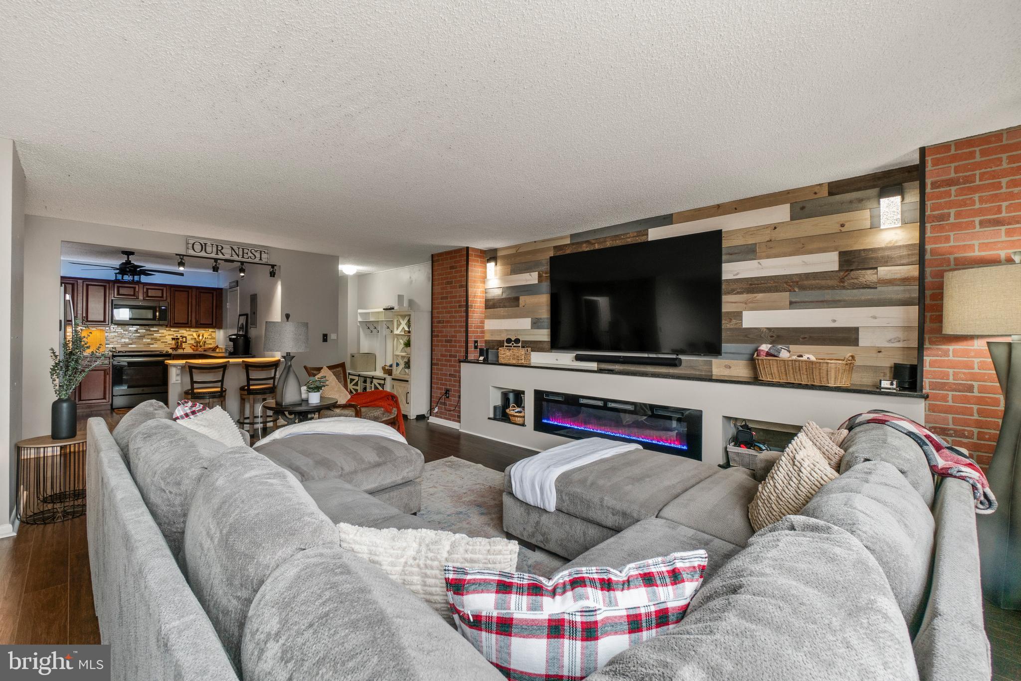 205 East Joppa Road, Unit 708 Baltimore, MD 21286 - Photo 10 of 35 Living room with firplace and granite mantal