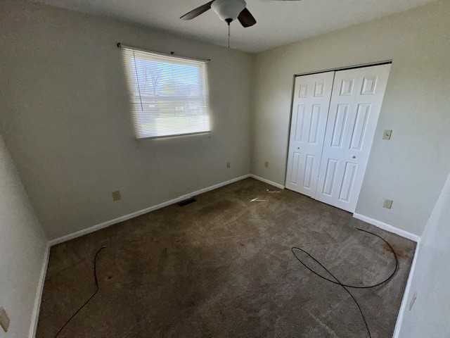 4744 Oxtoby Street Springfield, OH 45505 - Photo 11 of 19 This cozy bedroom features carpeted flooring and ample natural light through a single???????????????????????? window.