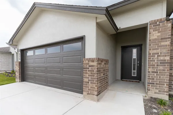 a view of outdoor space and garage