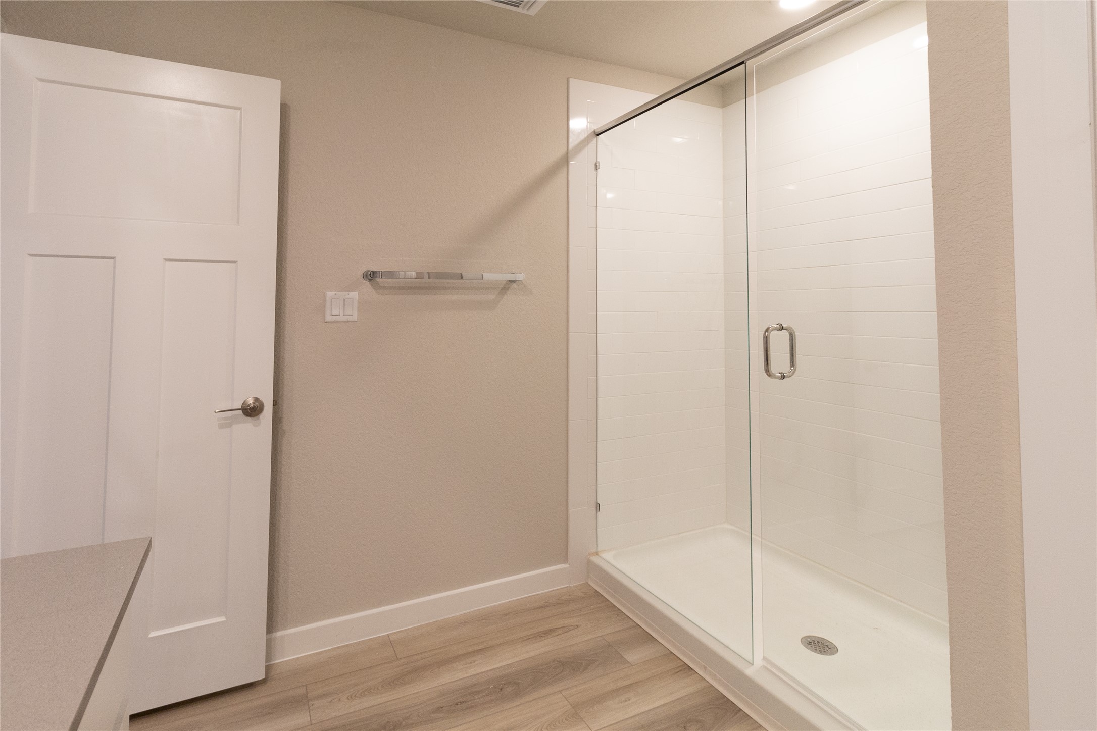 325 Coda Crossing Georgetown, TX 78633 - Photo 14 of 24 a bathroom with a glass shower door