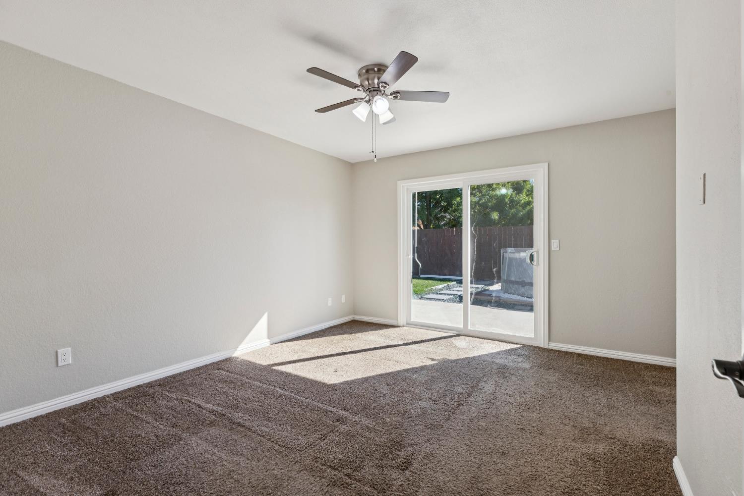 2612 Star Oak Court Modesto, CA 95355 - Photo 11 of 26 a view of an empty room with a window