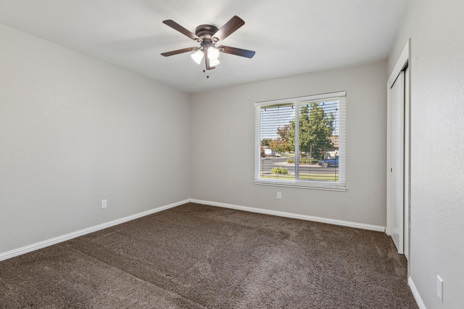 2612 Star Oak Court Modesto, CA 95355 - Photo 13 of 26 an empty room with a window