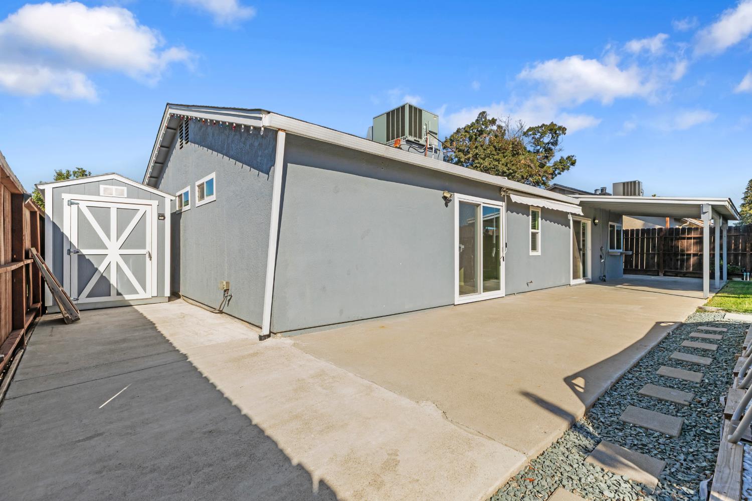 2612 Star Oak Court Modesto, CA 95355 - Photo 5 of 26 a view of a house with a roof deck