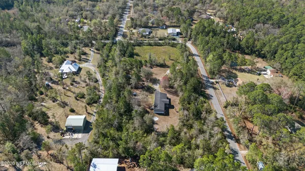 an aerial view of a city with lots of residential buildings
