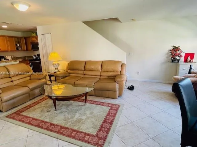 a living room with furniture and a couch