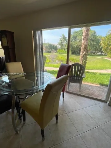 a view of a patio with chair and table