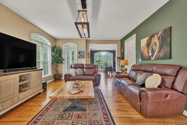 a view of entryway with a table and a chandelier
