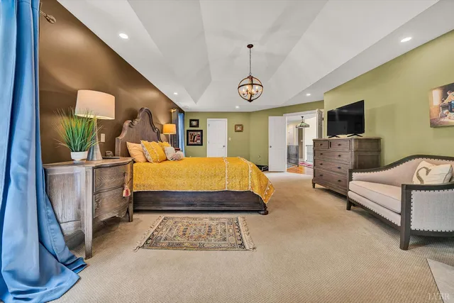 a kitchen with stainless steel appliances kitchen island granite countertop a sink and cabinets