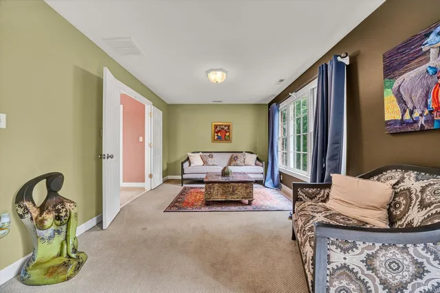 a large kitchen with a large counter space cabinets and appliances