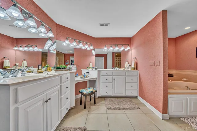 a living room with furniture a rug and a large window