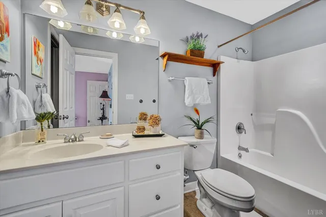 a kitchen with a stove a sink and a refrigerator