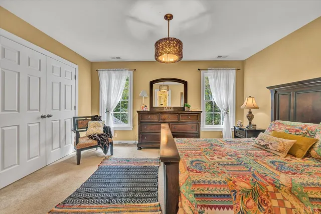 a view of a house with a snow on the road