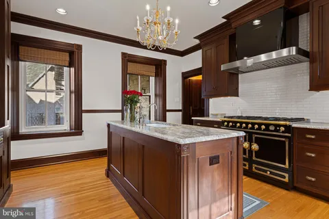 a spacious bathroom with a bathtub and sink