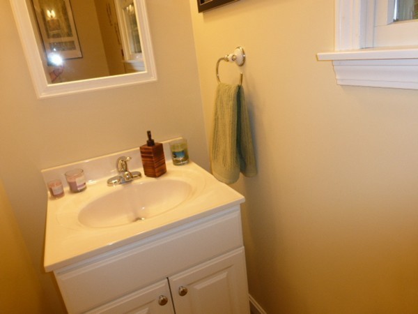 36 Torrey Street Easthampton, MA 01027 - Photo 11 of 20 a bathroom with a sink and a mirror