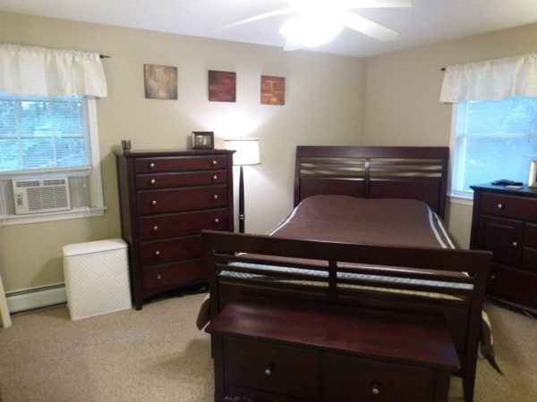 36 Torrey Street Easthampton, MA 01027 - Photo 12 of 20 a living room with furniture and a piano