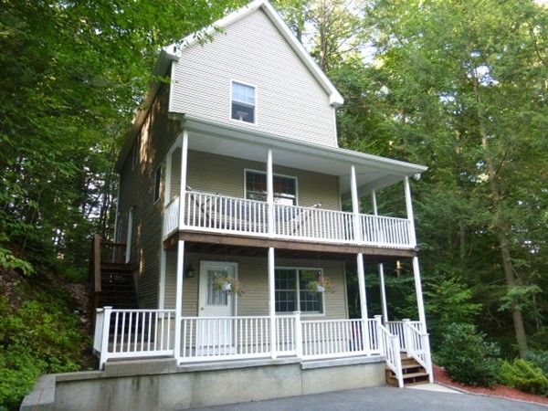 36 Torrey Street Easthampton, MA 01027 - Photo 3 of 20 a front view of a house with a porch