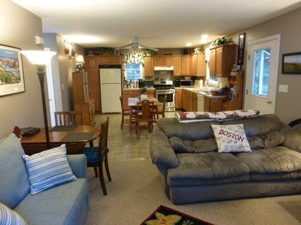 36 Torrey Street Easthampton, MA 01027 - Photo 9 of 20 a living room with furniture and a view of kitchen