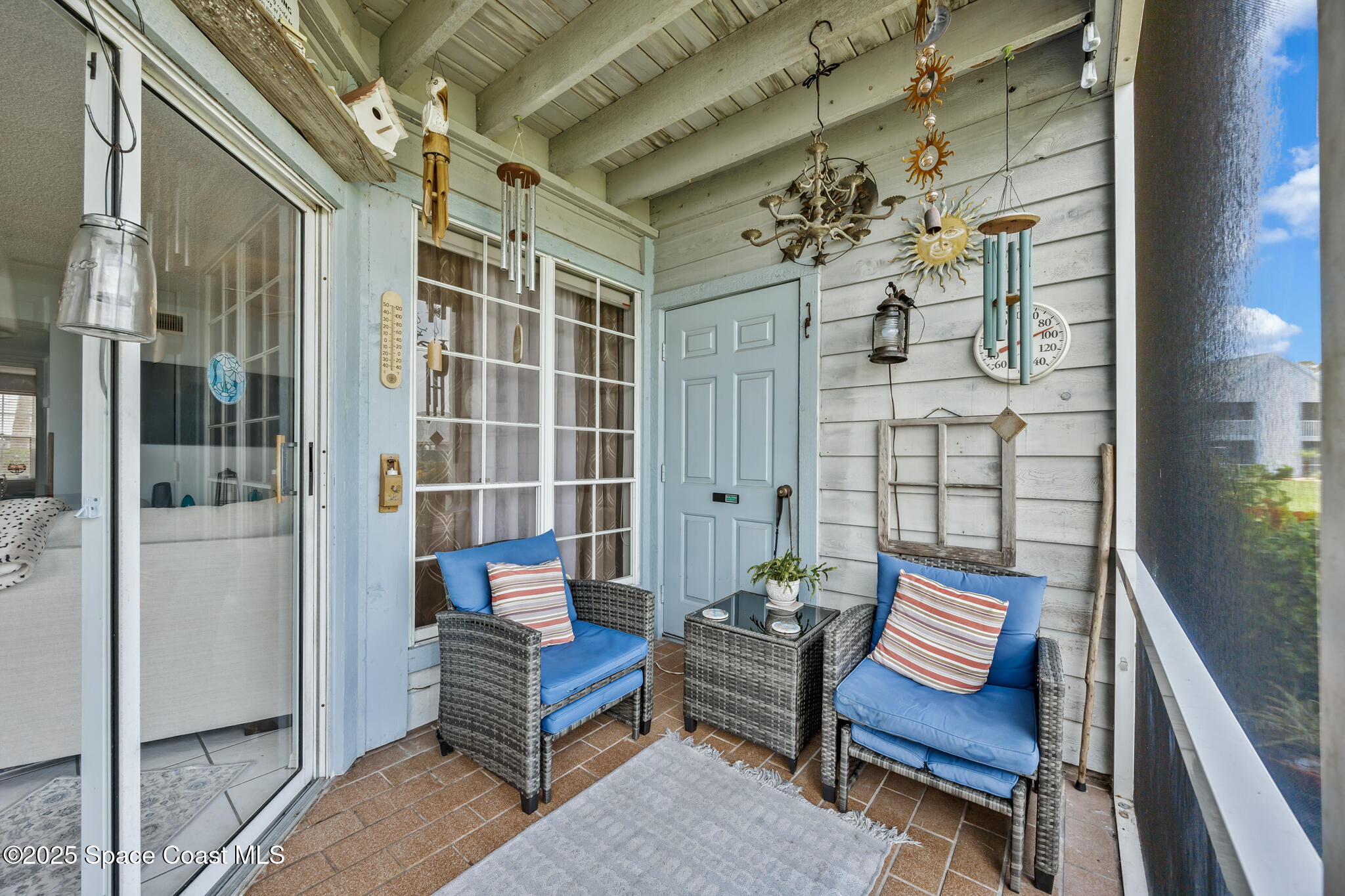 7420 U.S. Rte 1, Unit 106 Cocoa, FL 32927 - Photo 12 of 41 a building outdoor space with patio furniture